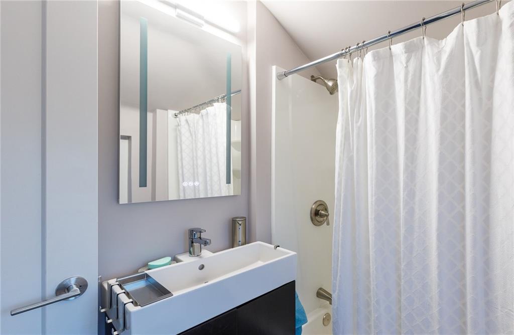 9347 Pannier Road Pittsburgh, PA 15237 - Photo 17 of 25 Mirror has 3 settings, Defogger, Light, Warm Light - plus it is a medicine cabinet