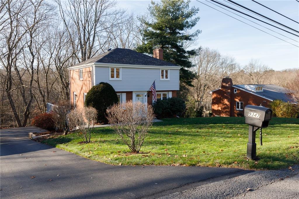 9347 Pannier Road Pittsburgh, PA 15237 - Photo 25 of 25 Front yard is relatively flat and a great place for kids or pets to play.