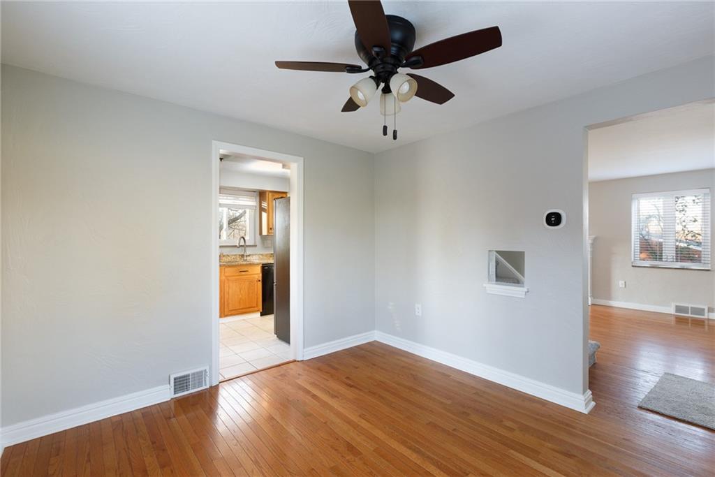 9347 Pannier Road Pittsburgh, PA 15237 - Photo 7 of 25 Dining room - view towards kitchen and living room - smart thermostat