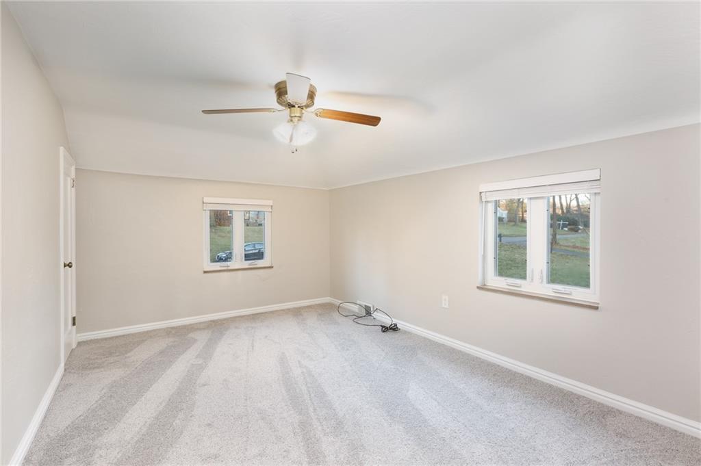 9347 Pannier Road Pittsburgh, PA 15237 - Photo 10 of 25 Master bedroom with ceiling fan, multi-pane windows, new blinds, new carpet