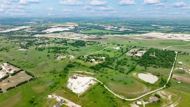 a view of a lake in a yard