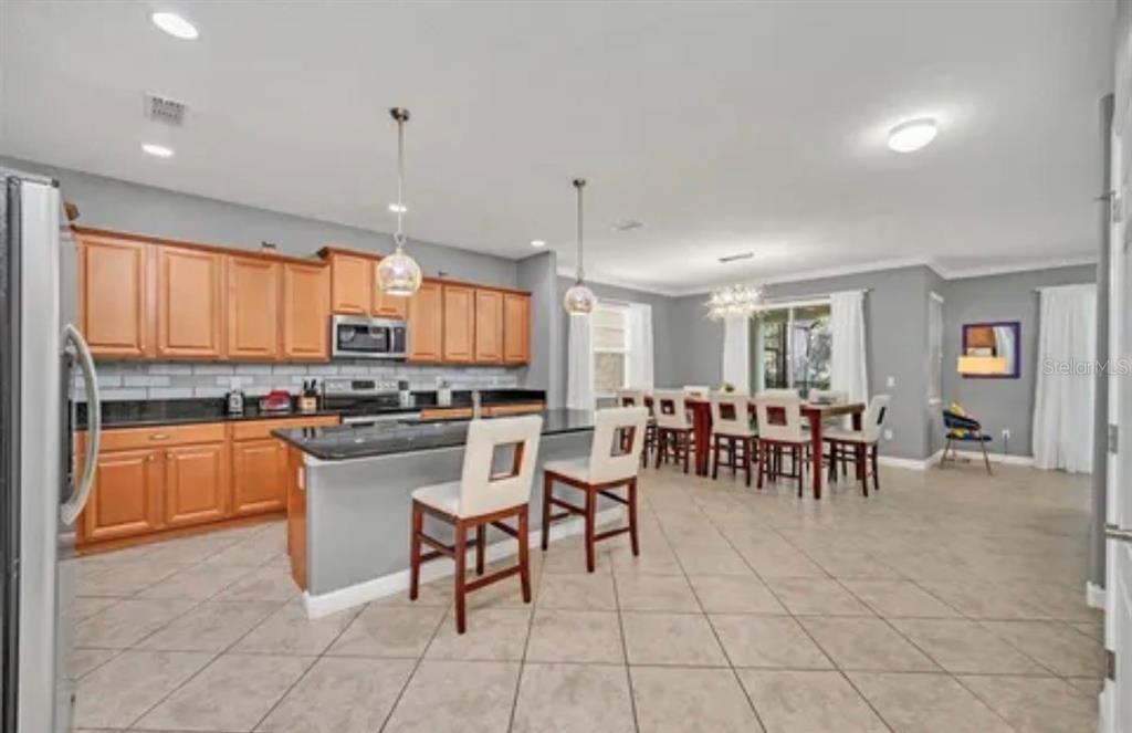 8854 Candy Palm Road Kissimmee, FL 34747 - Photo 4 of 40