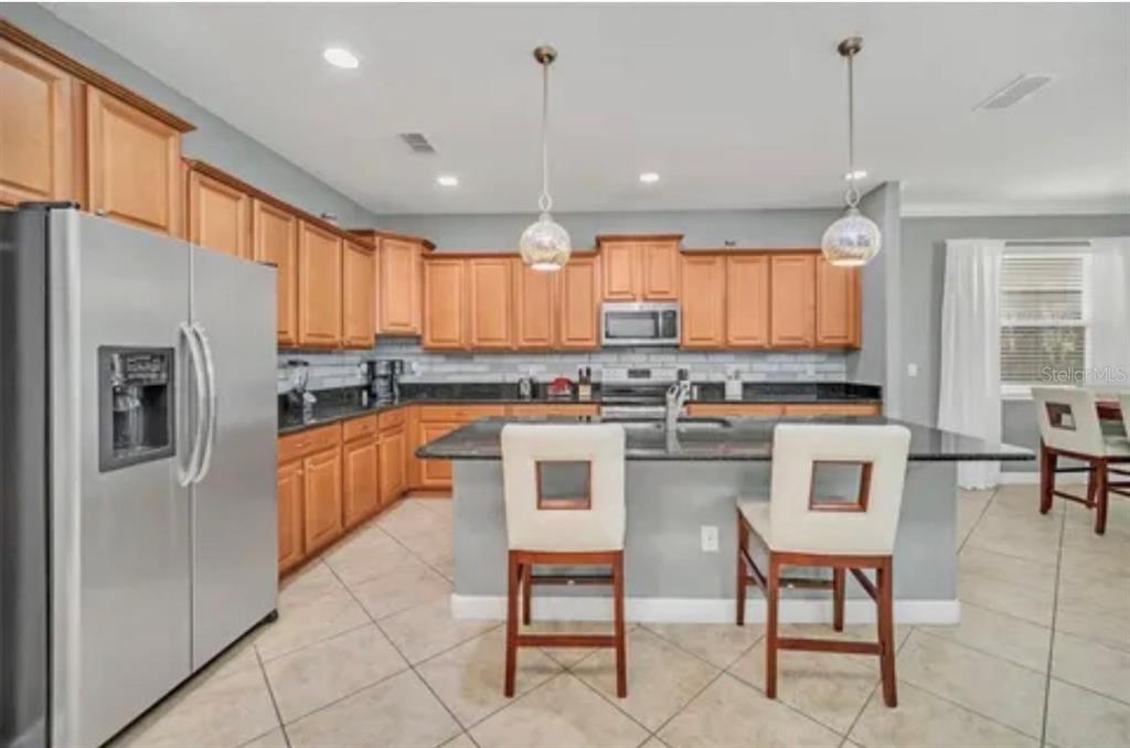 8854 Candy Palm Road Kissimmee, FL 34747 - Photo 6 of 40