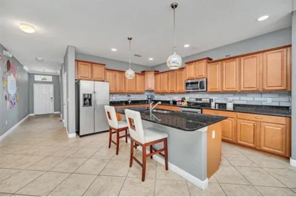 8854 Candy Palm Road Kissimmee, FL 34747 - Photo 7 of 40