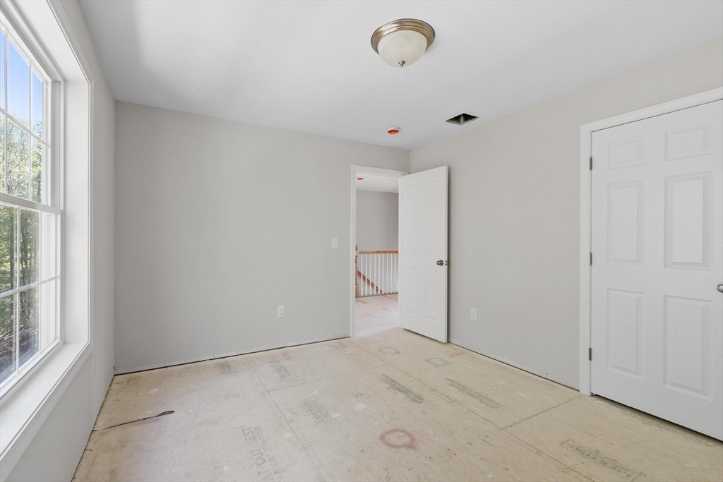 22 Benoit Avenue Pelham, NH 03076 - Photo 30 of 42 a view of an empty room