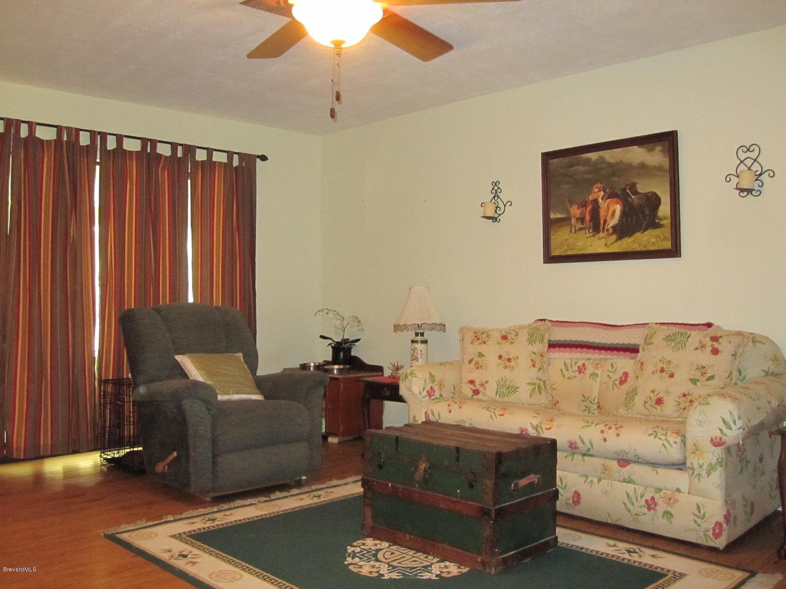 1086 Macco Road Cocoa, FL 32927 - Photo 2 of 23 Living Room to SunRoom