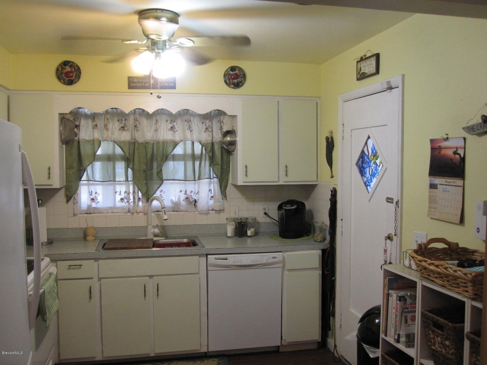 1086 Macco Road Cocoa, FL 32927 - Photo 3 of 23 Kitchen door to carport