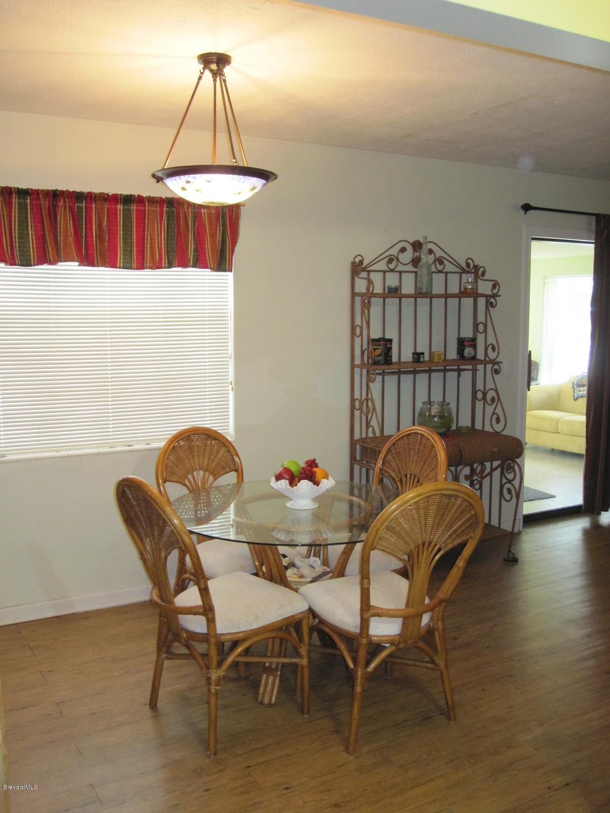 1086 Macco Road Cocoa, FL 32927 - Photo 4 of 23 Dining Room Looking at Liv & Sun Room
