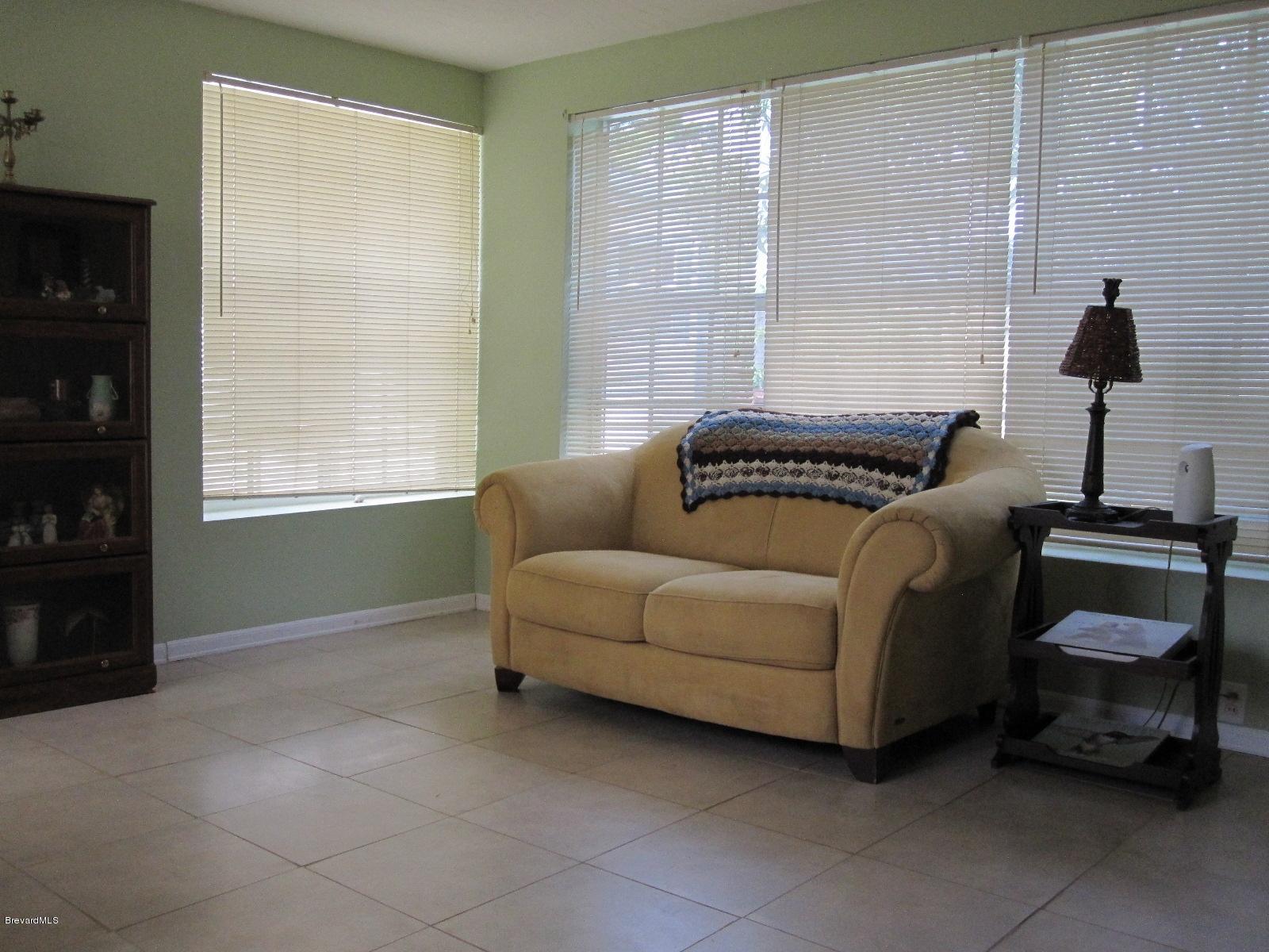 1086 Macco Road Cocoa, FL 32927 - Photo 5 of 23 Sun Room Blinds Convey