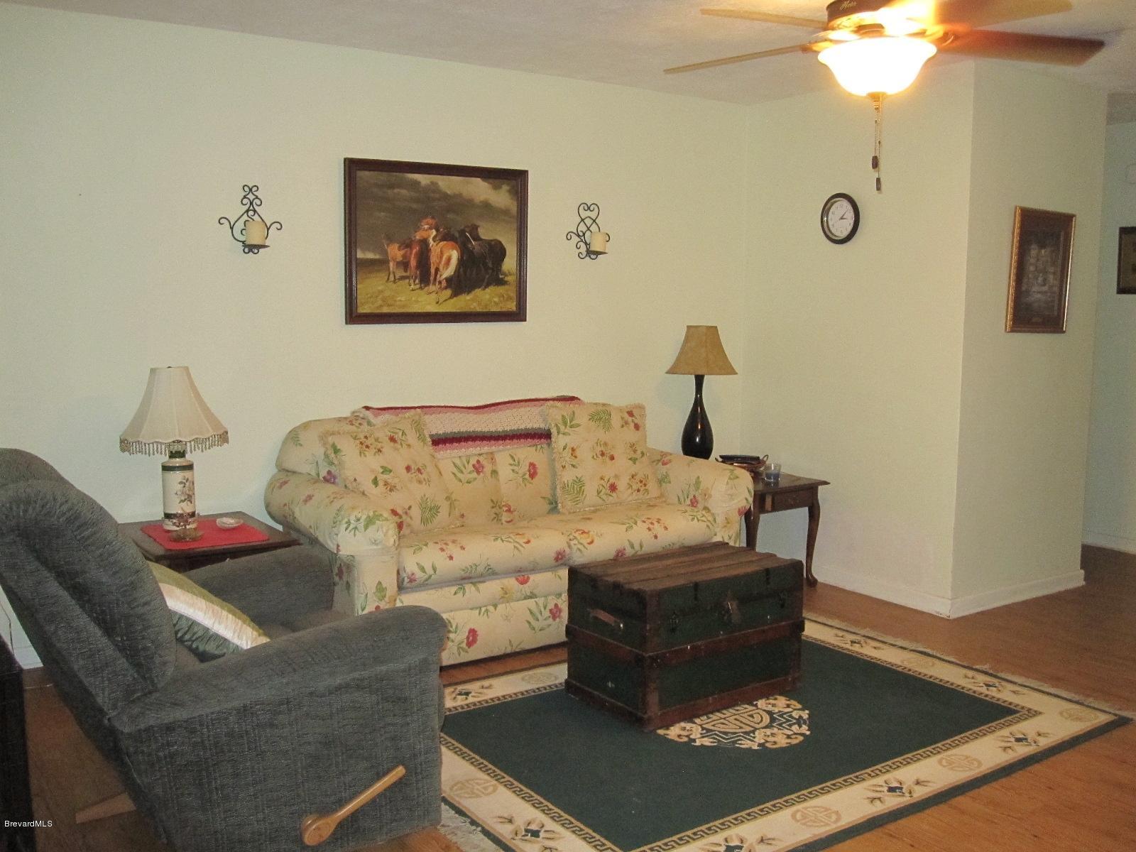1086 Macco Road Cocoa, FL 32927 - Photo 6 of 23 Living Room, hallway to bedrooms