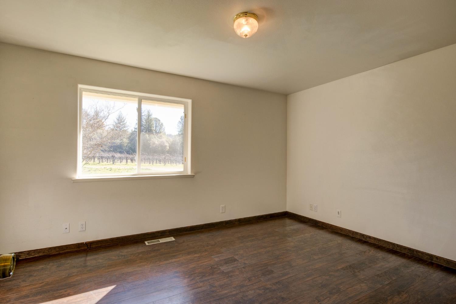 3900 Tawanka Road Somerset, CA 95684 - Photo 26 of 84 an empty room with a window