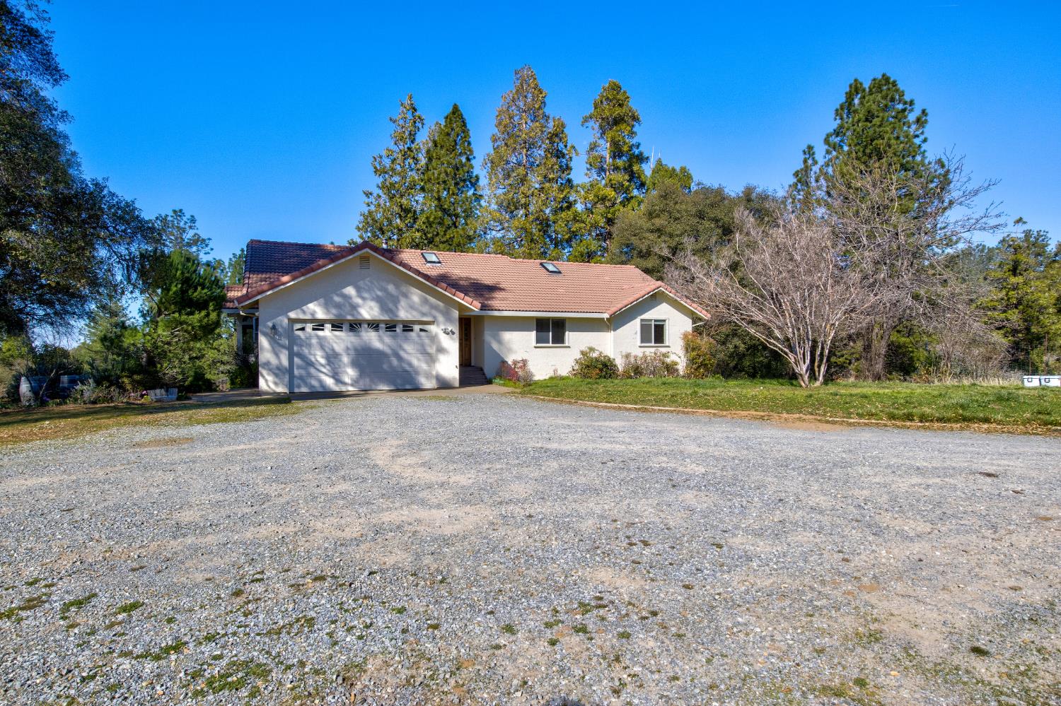 3900 Tawanka Road Somerset, CA 95684 - Photo 41 of 84 a house with trees in the background