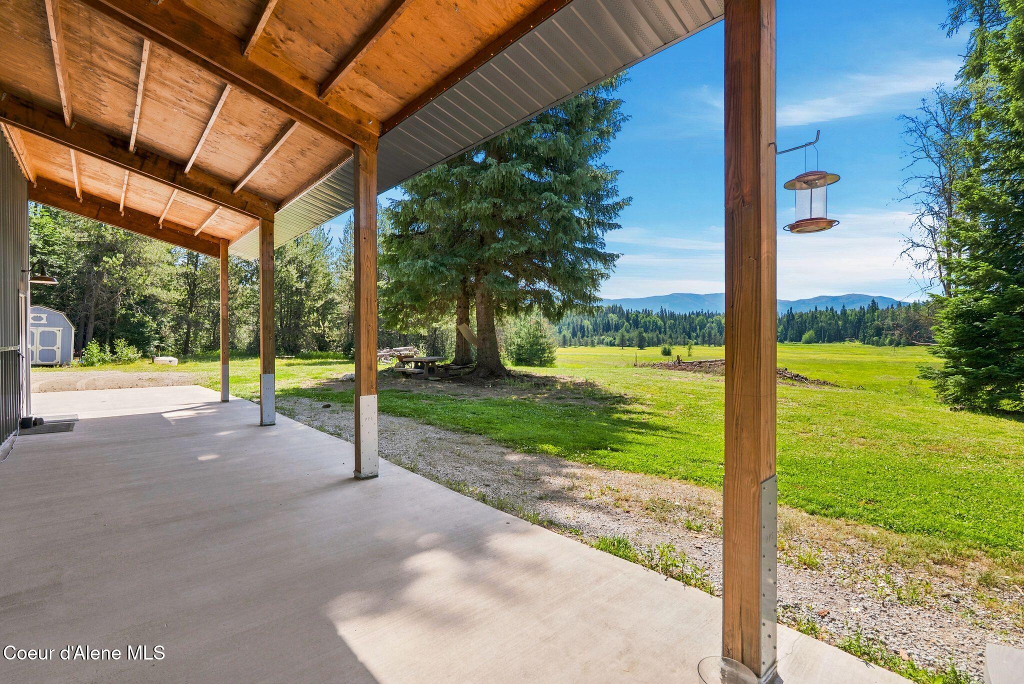 3566 Upper Gold Creek Road Sandpoint, ID 83864 - Photo 15 of 21 Covered Front Porch and Patio