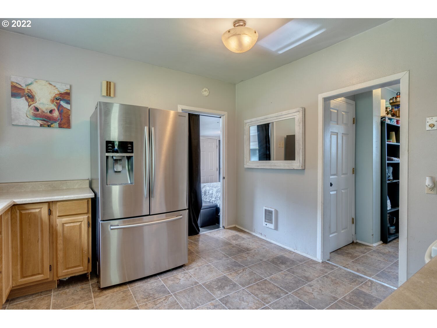 1045 Coal Creek Road Longview, WA 98632 - Photo 21 of 32 a kitchen with stainless steel appliances granite countertop a refrigerator and a stove