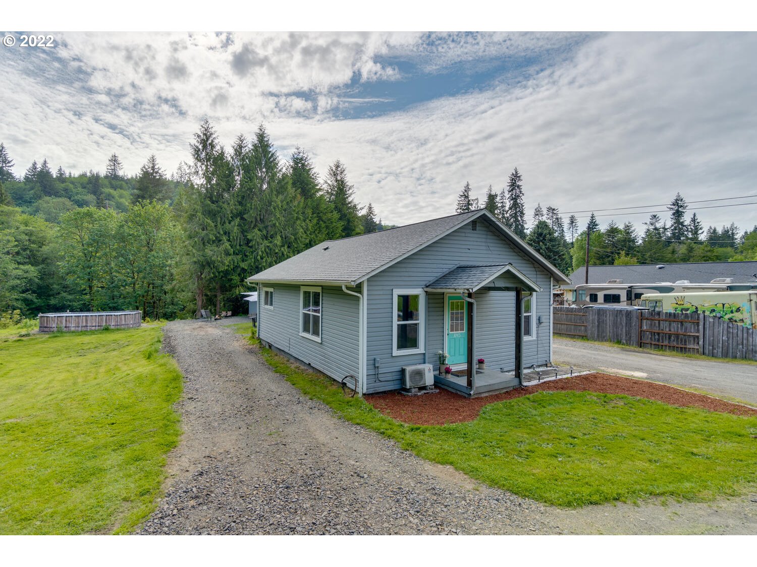 1045 Coal Creek Road Longview, WA 98632 - Photo 3 of 32 a view of a house with backyard and garden