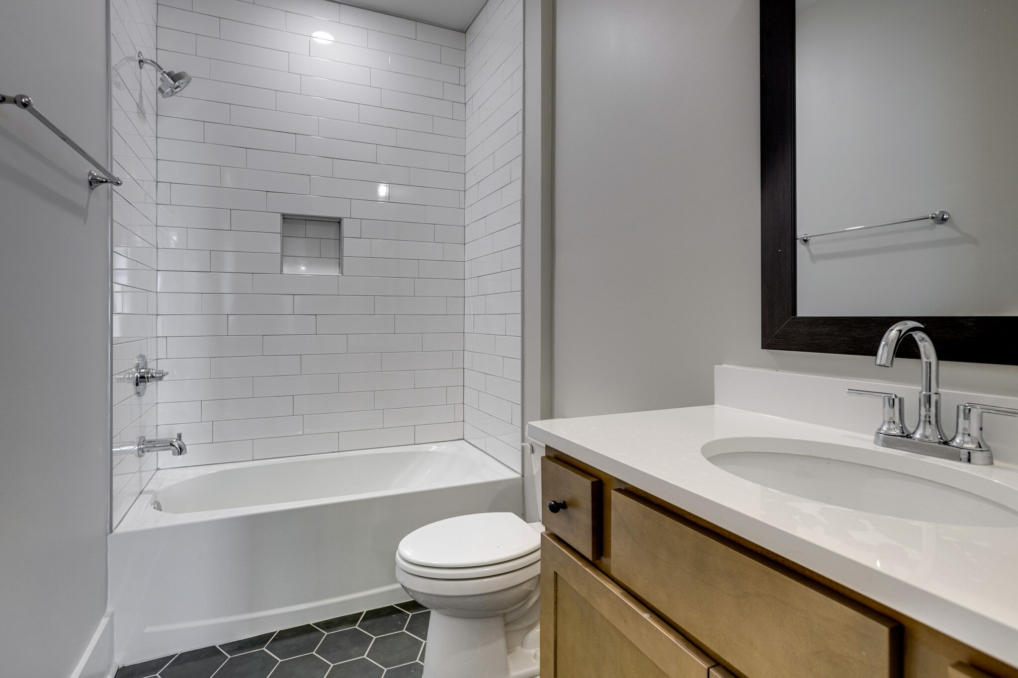 1057 Fallow Road Mount Juliet, TN 37122 - Photo 16 of 41 a bathroom with a sink a toilet and shower