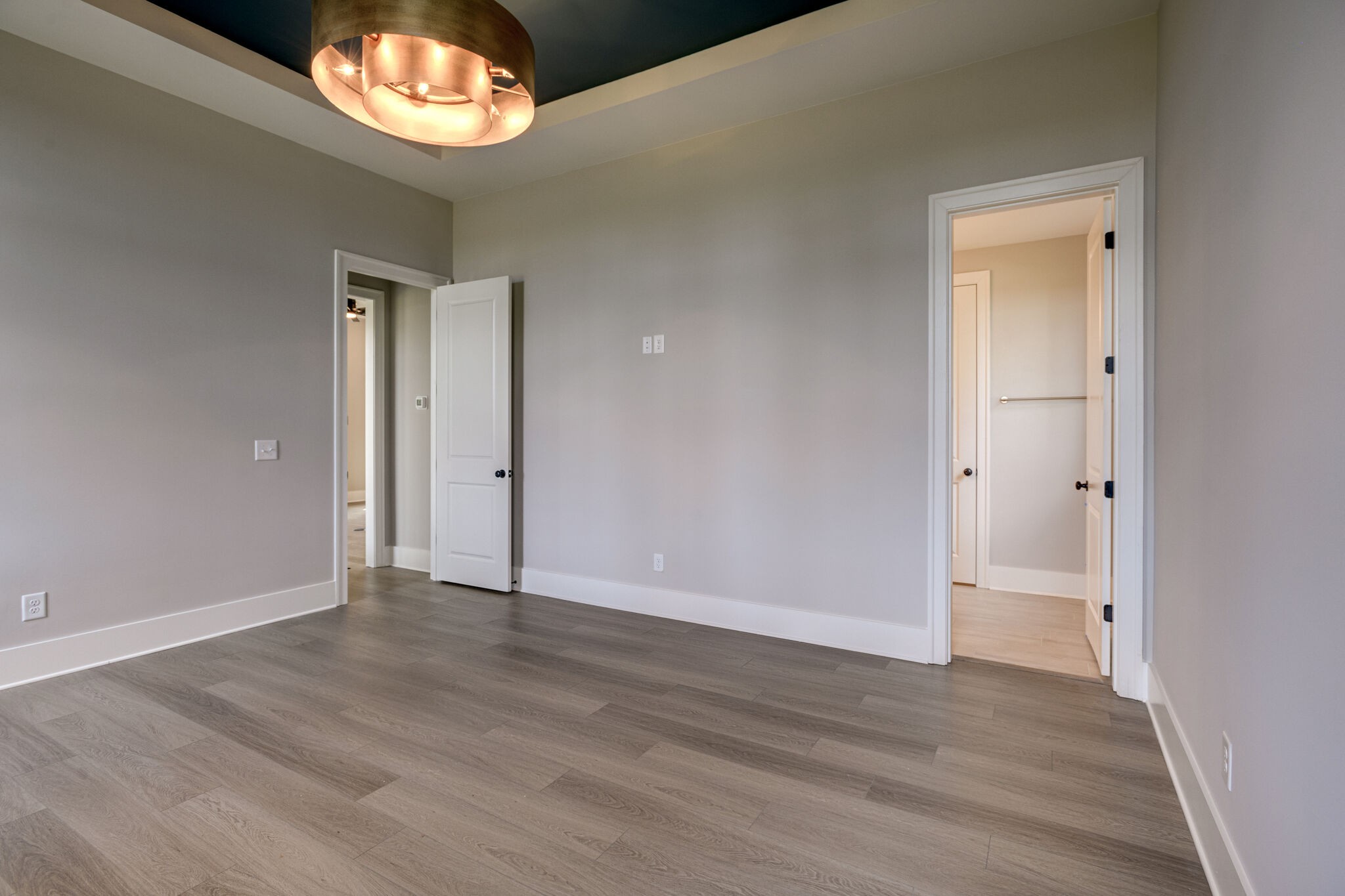 1057 Fallow Road Mount Juliet, TN 37122 - Photo 21 of 41 an empty room with wooden floor and windows