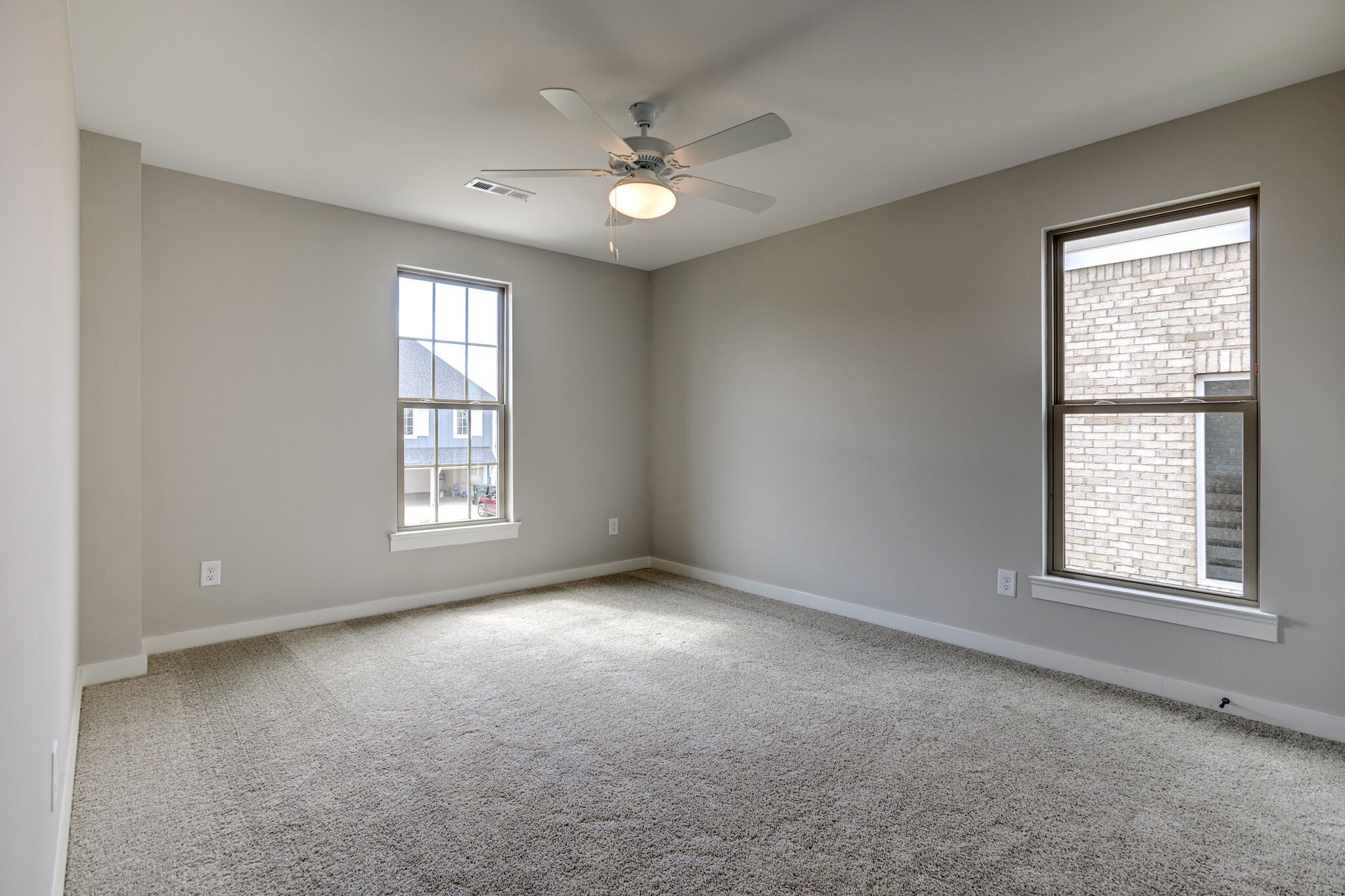 1057 Fallow Road Mount Juliet, TN 37122 - Photo 32 of 41 an empty room with windows and chandelier fan