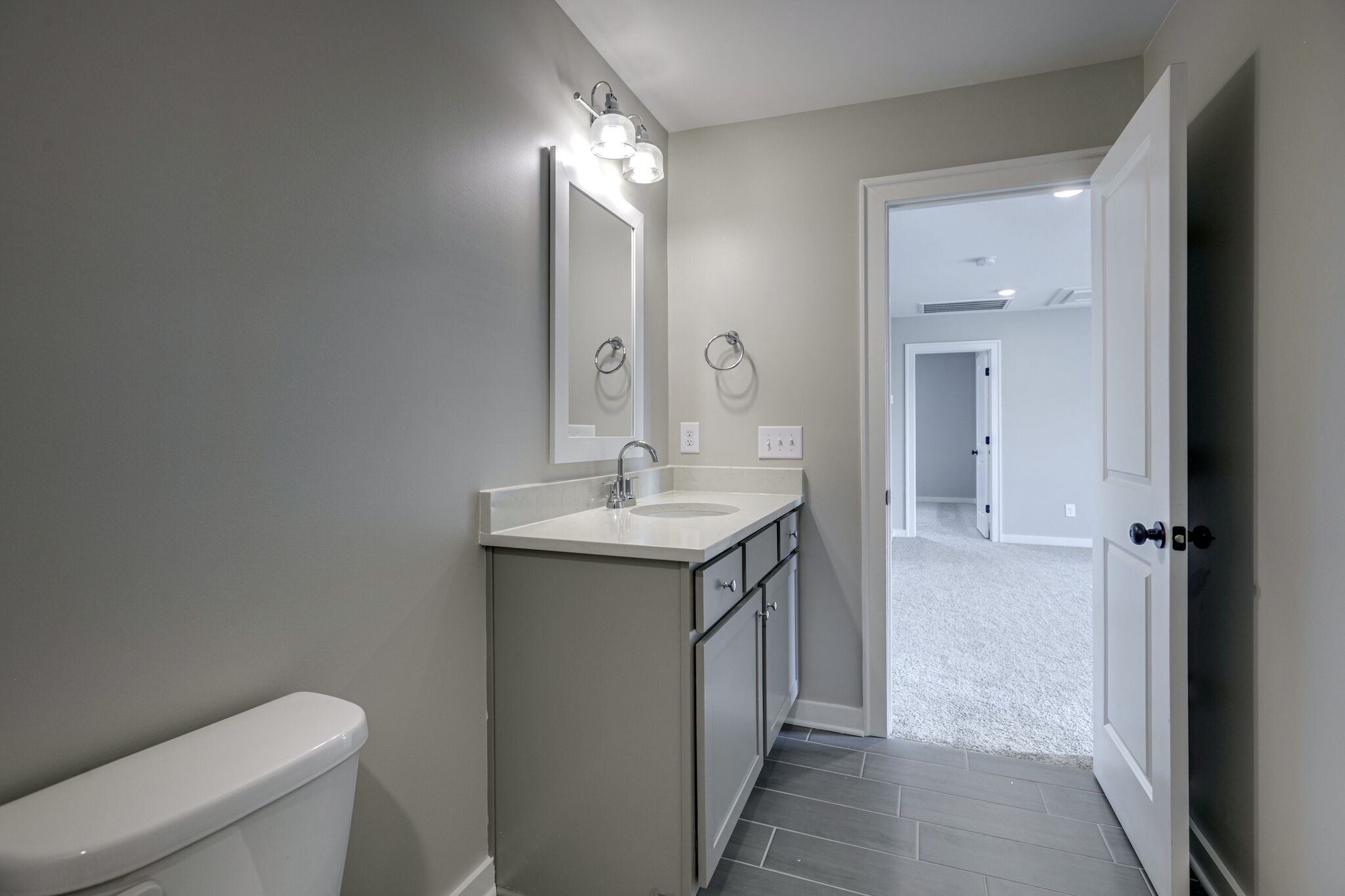 1057 Fallow Road Mount Juliet, TN 37122 - Photo 34 of 41 a bathroom with a sink toilet and vanity