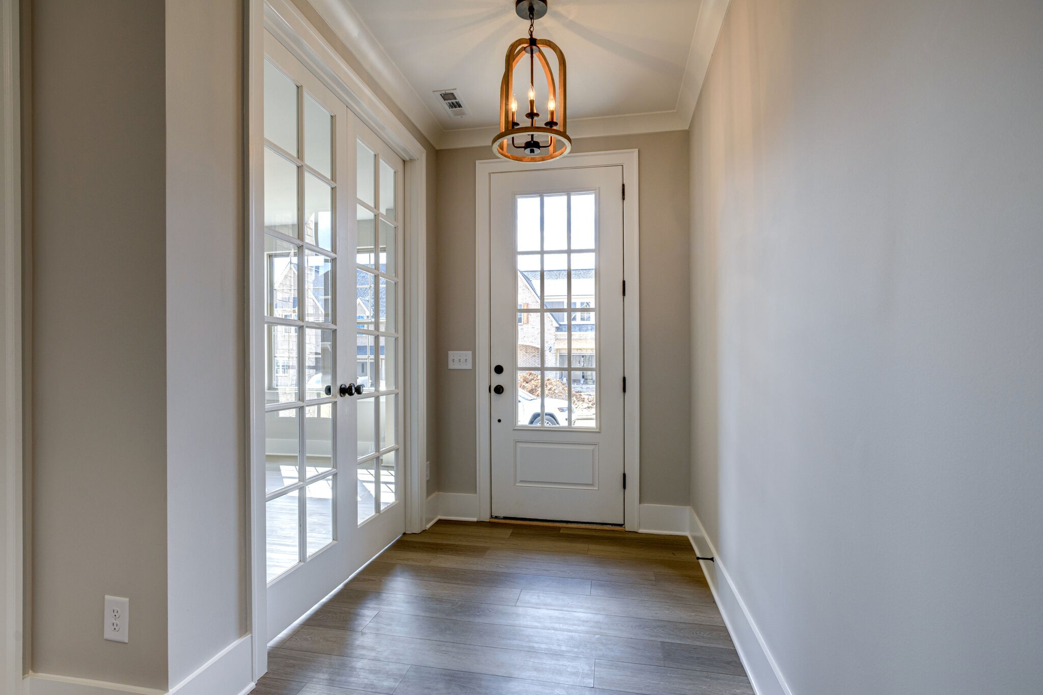 1057 Fallow Road Mount Juliet, TN 37122 - Photo 5 of 41 a view of empty room with wooden floor and fan