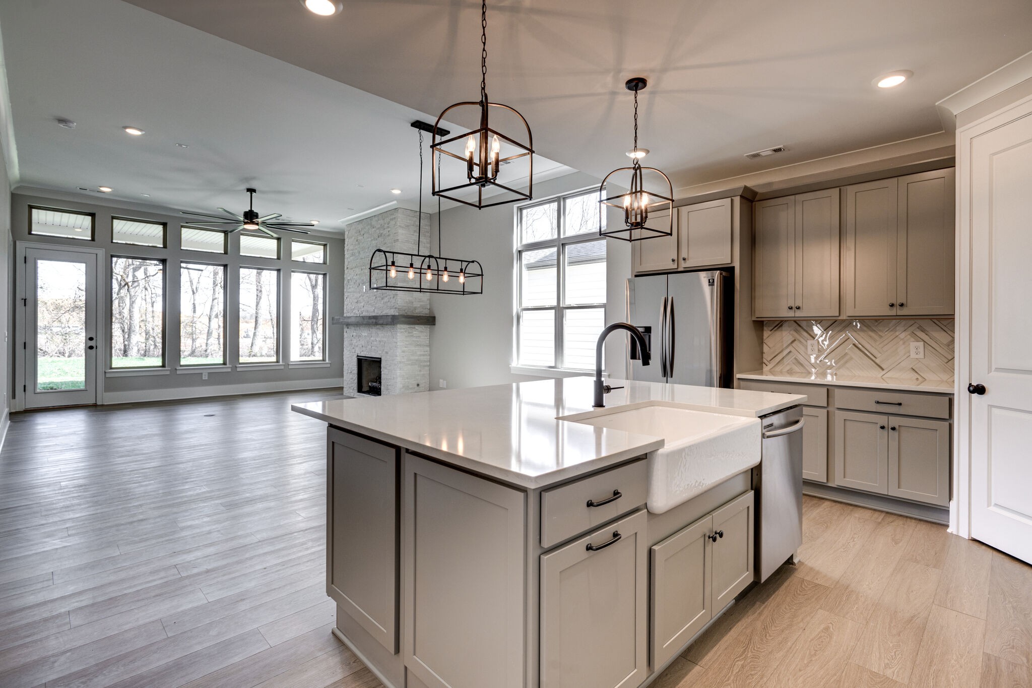 1057 Fallow Road Mount Juliet, TN 37122 - Photo 7 of 41 a kitchen with sink cabinets and wooden floor