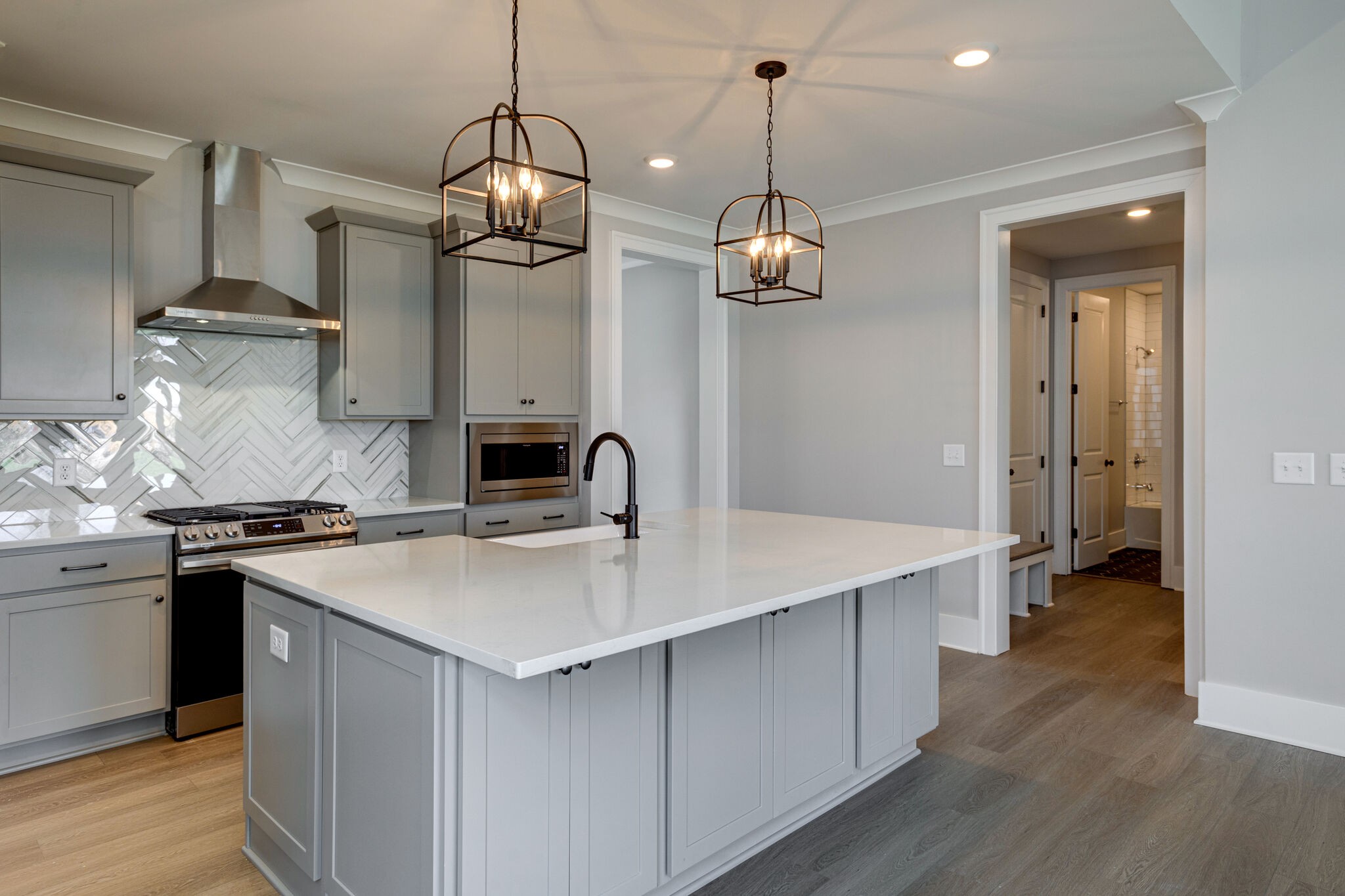 1057 Fallow Road Mount Juliet, TN 37122 - Photo 10 of 41 a kitchen with a sink a stove and wooden floor