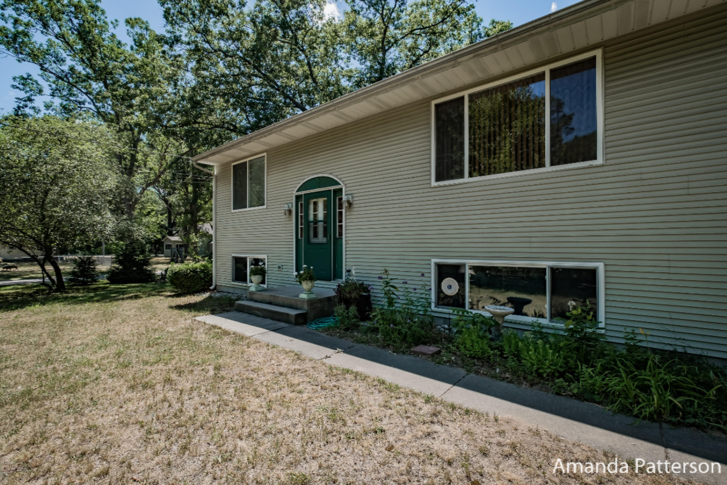 143 South Mill Iron Road Muskegon, MI 49442 - Photo 3 of 26 front view