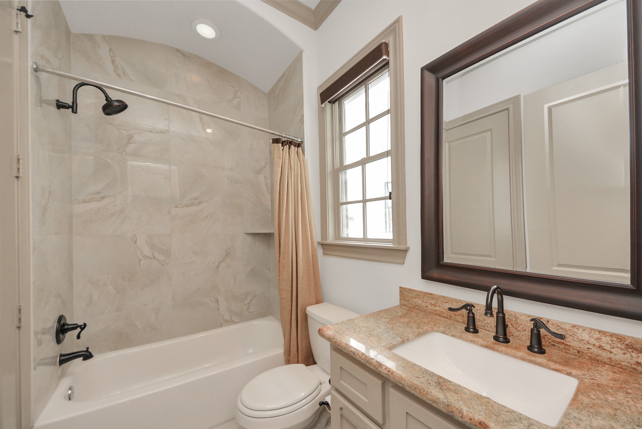 314 West Clay Street Houston, TX 77019 - Photo 23 of 44 a bathroom with a granite countertop sink toilet and shower