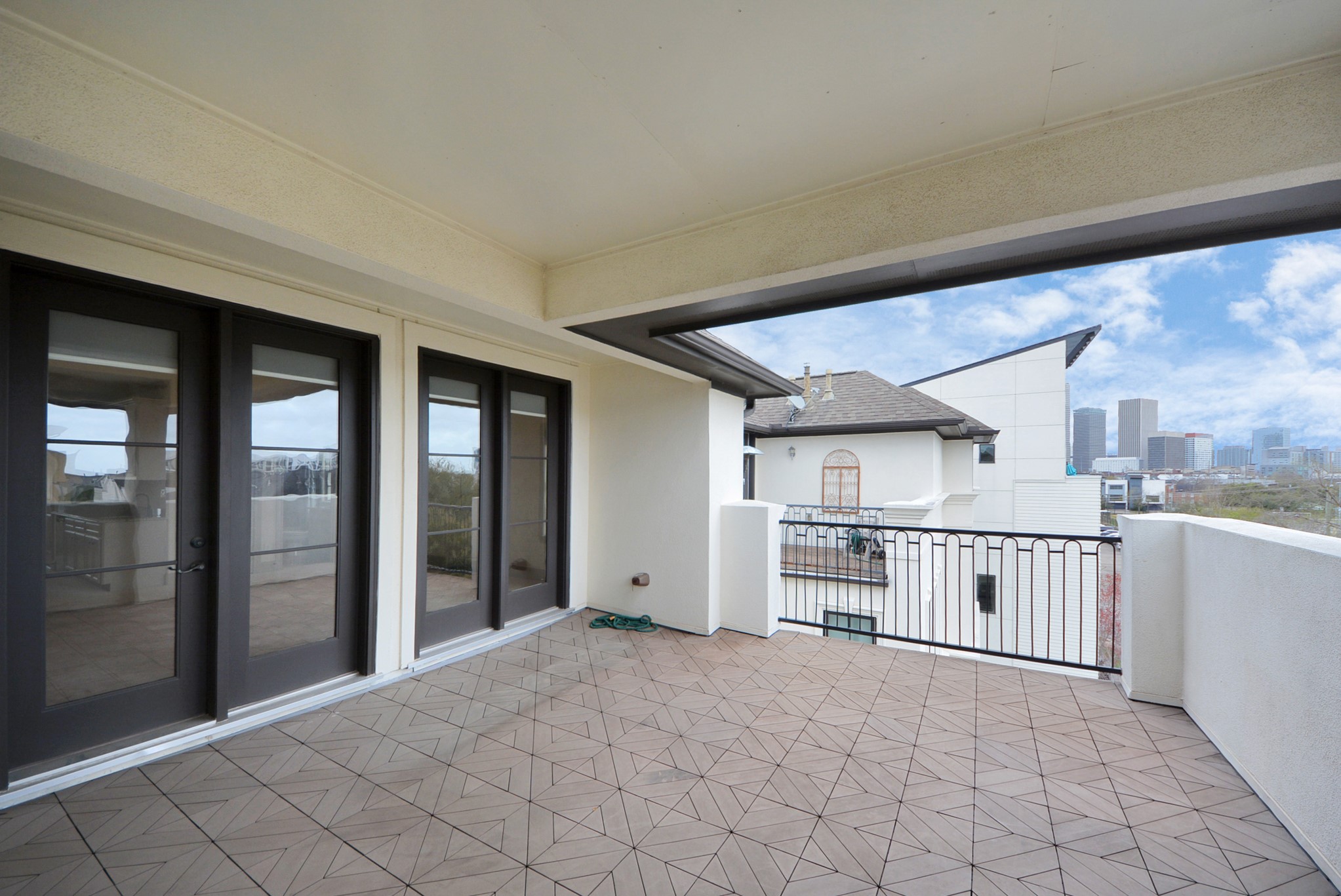 314 West Clay Street Houston, TX 77019 - Photo 40 of 44 a kitchen with stainless steel appliances granite countertop a refrigerator and white cabinets