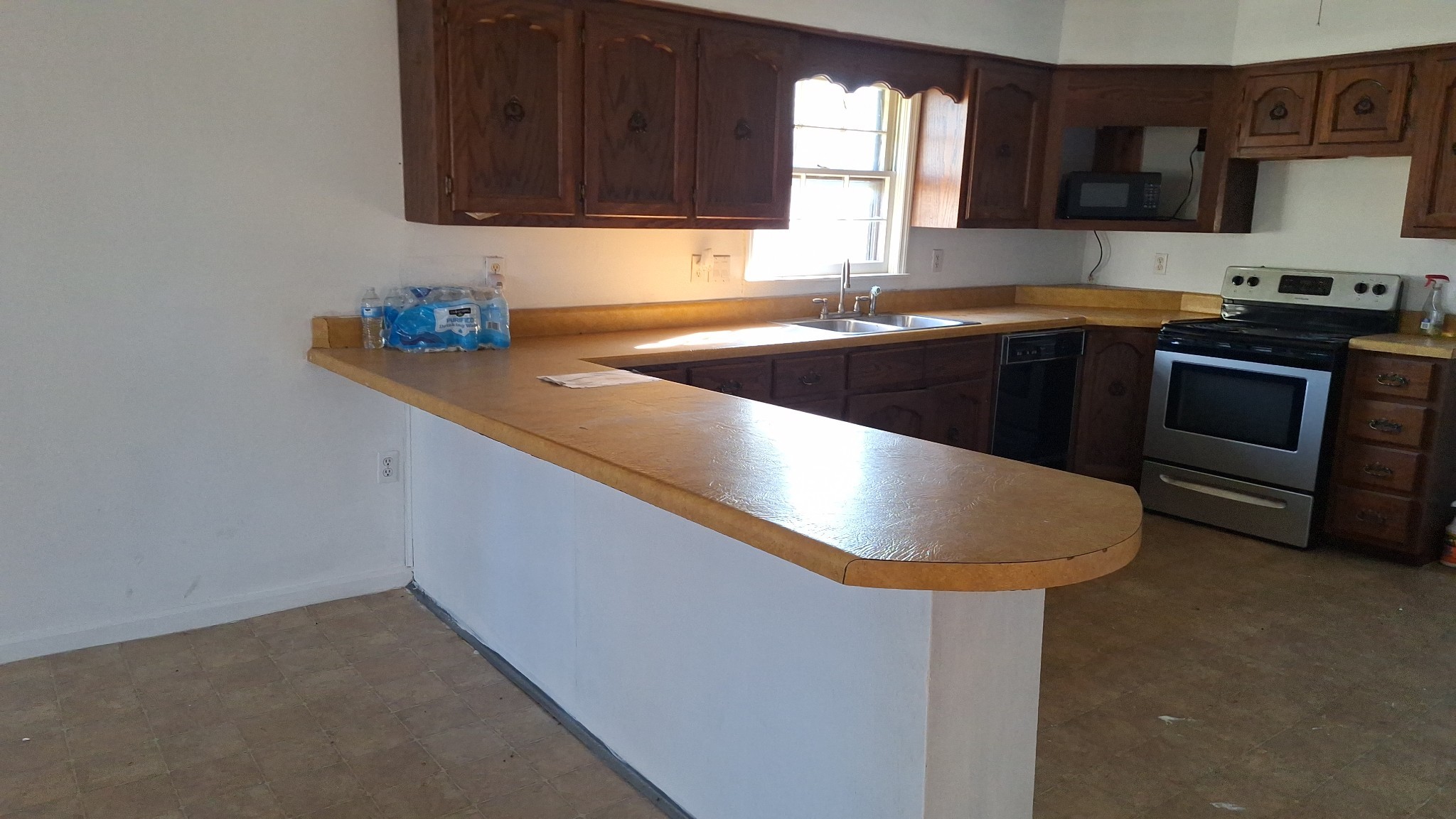 538 Mt Nebo Road Iron City, TN 38463 - Photo 6 of 33 a kitchen with stainless steel appliances a sink stove and microwave