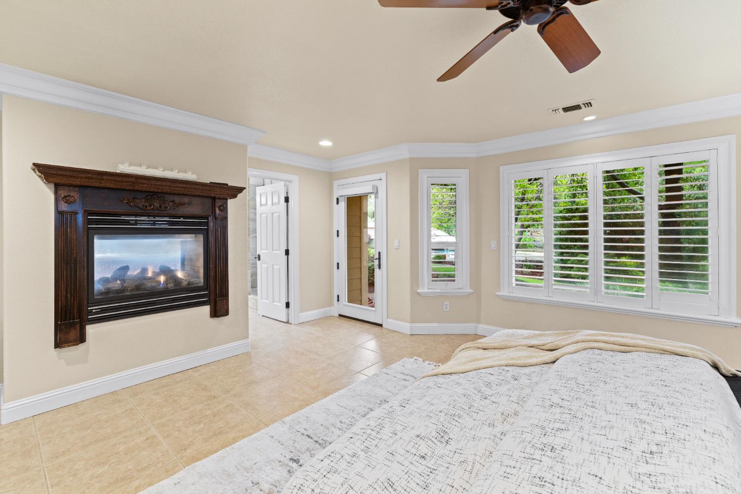 7396 Callison Road Penryn, CA 95663 - Photo 39 of 99 Two-sided fireplace in the primary suite