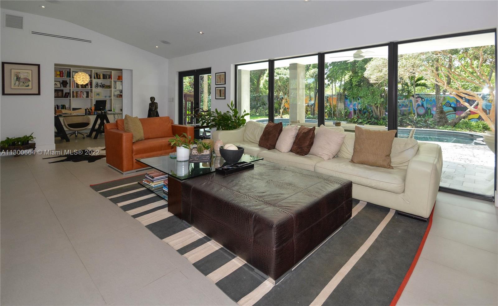 4560 Bay Point Road Miami, FL 33137 - Photo 8 of 40 a living room with furniture and a large window