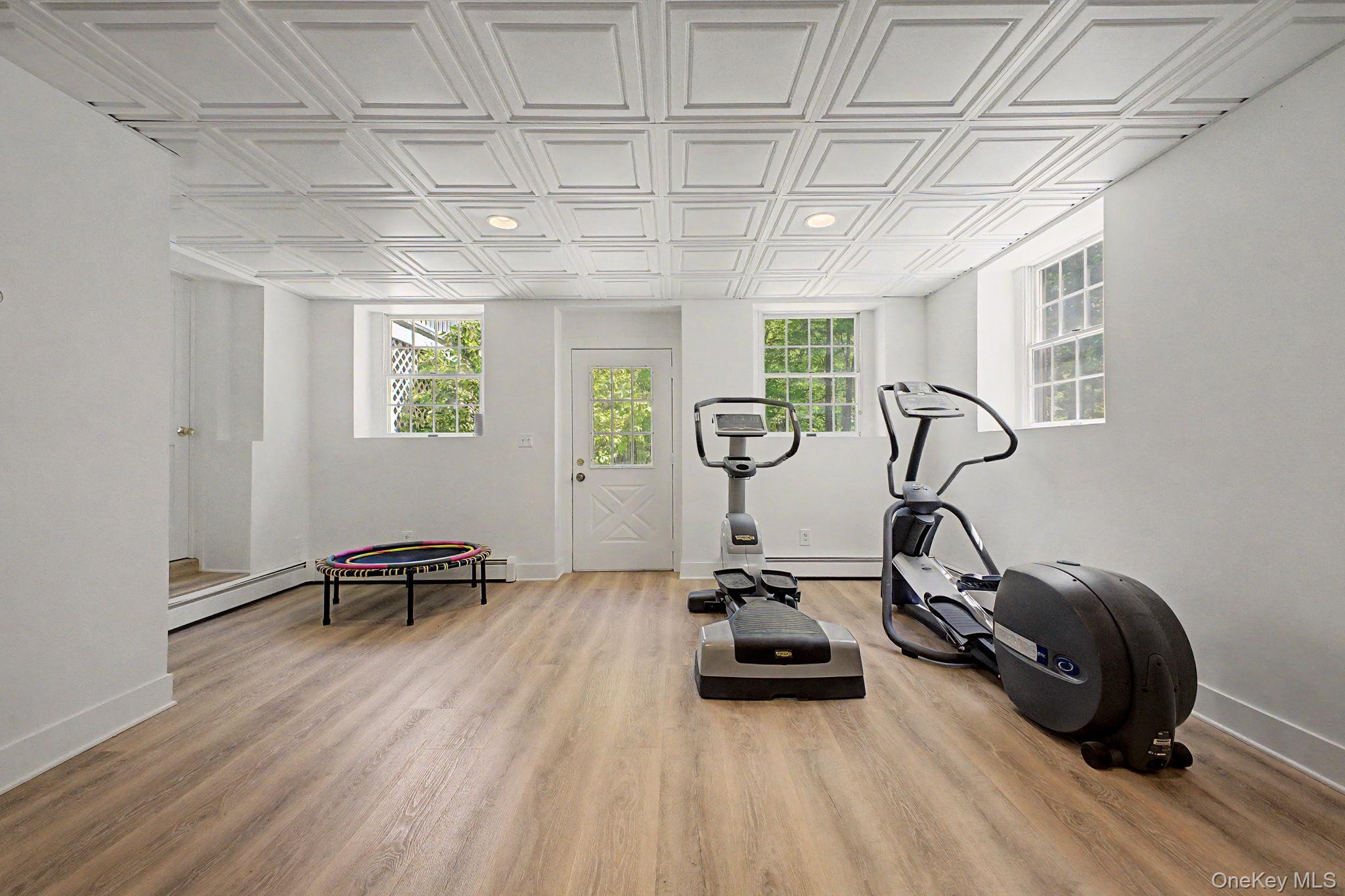 240 Eastwoods Road Pound Ridge, NY 10576 - Photo 38 of 46 a view of a room with gym equipment
