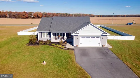a view of a house with a ocean view