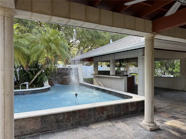a view of a porch with furniture