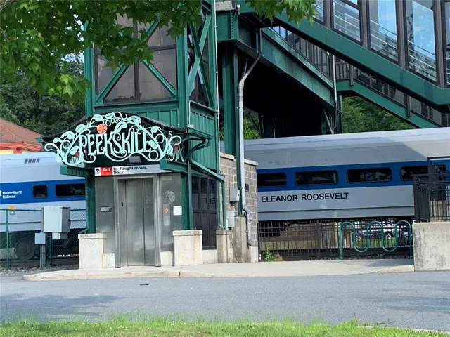 a view of a house with door and deck