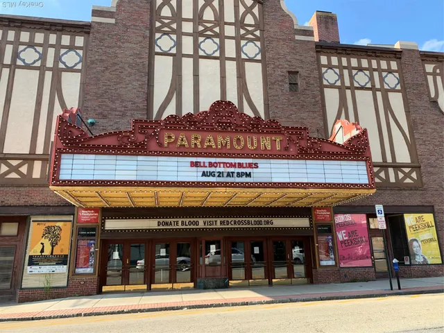 a view of a building with a street