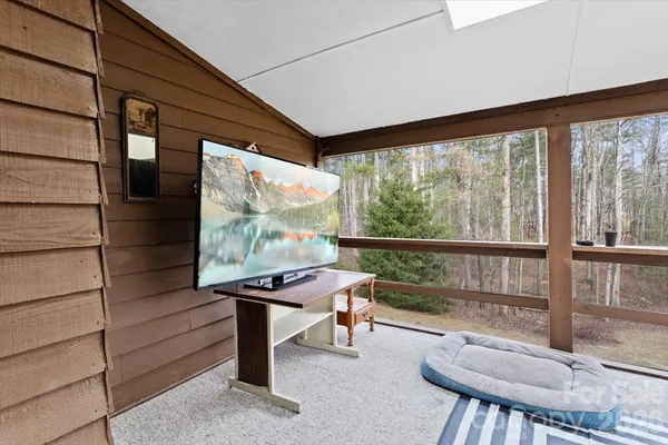 a sitting area with large window