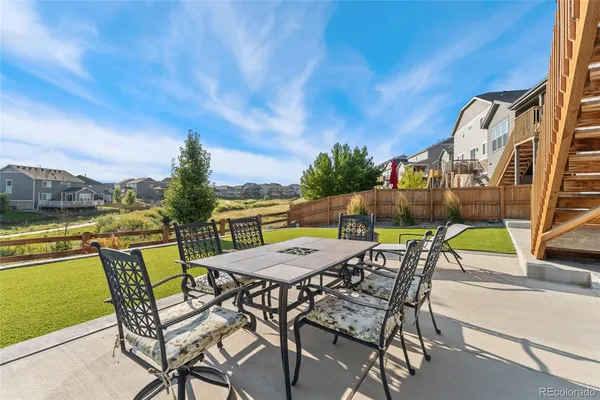 a view of an outdoor space with furniture and sitting area