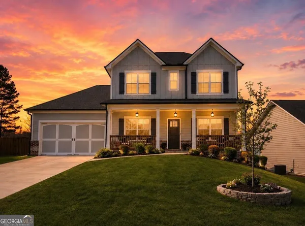a view of a yard in front of a house with a yard