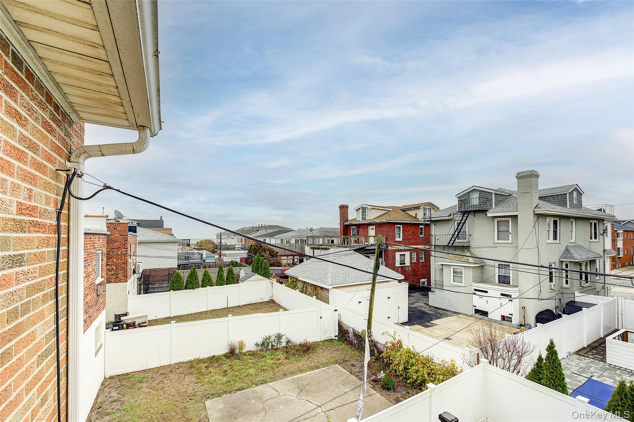 161 Beach 128th Street, Unit 1B Queens, NY 11694 - Photo 26 of 36 a view of a city from a terrace
