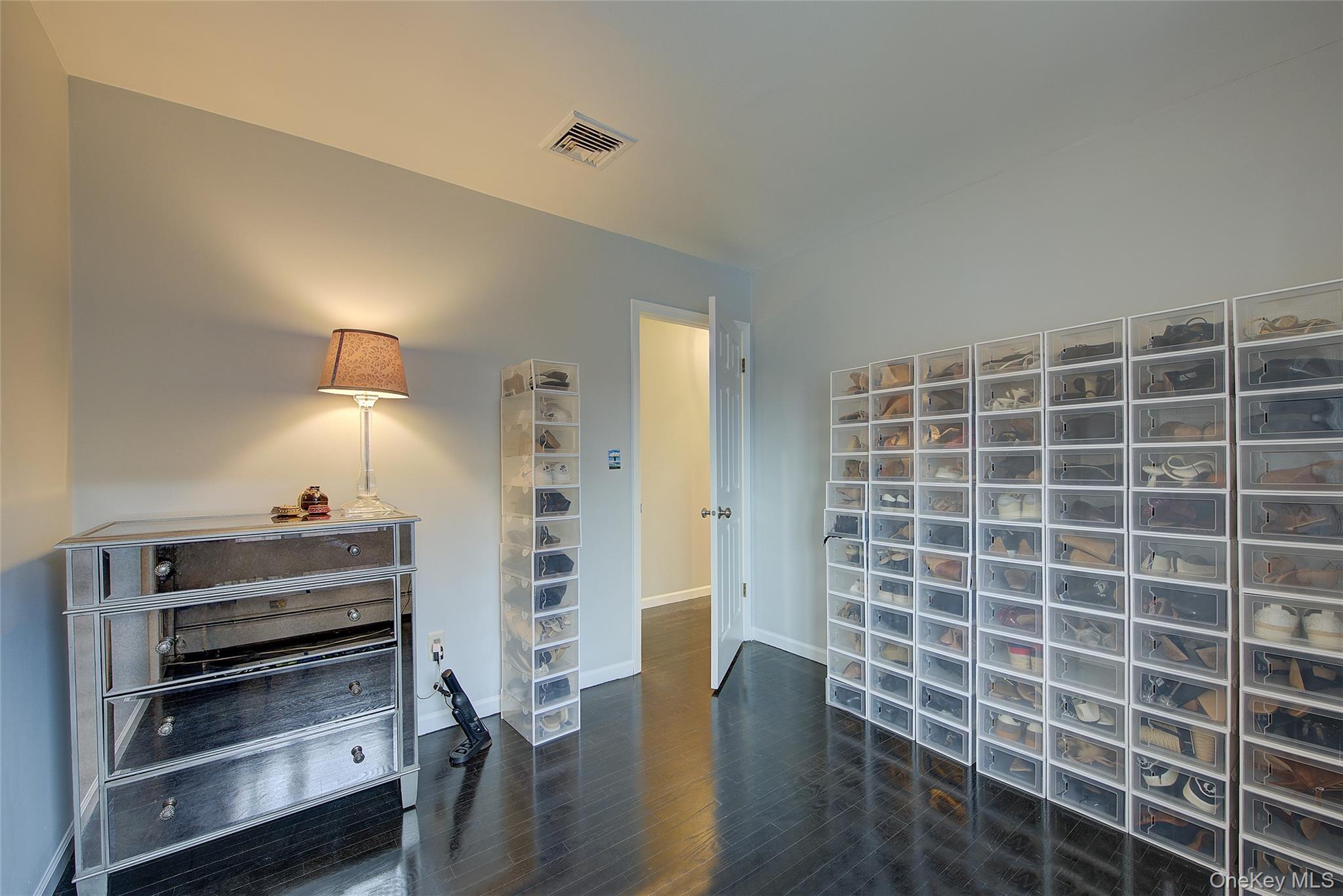 161 Beach 128th Street, Unit 1B Queens, NY 11694 - Photo 30 of 36 a view of a livingroom with furniture and an empty space