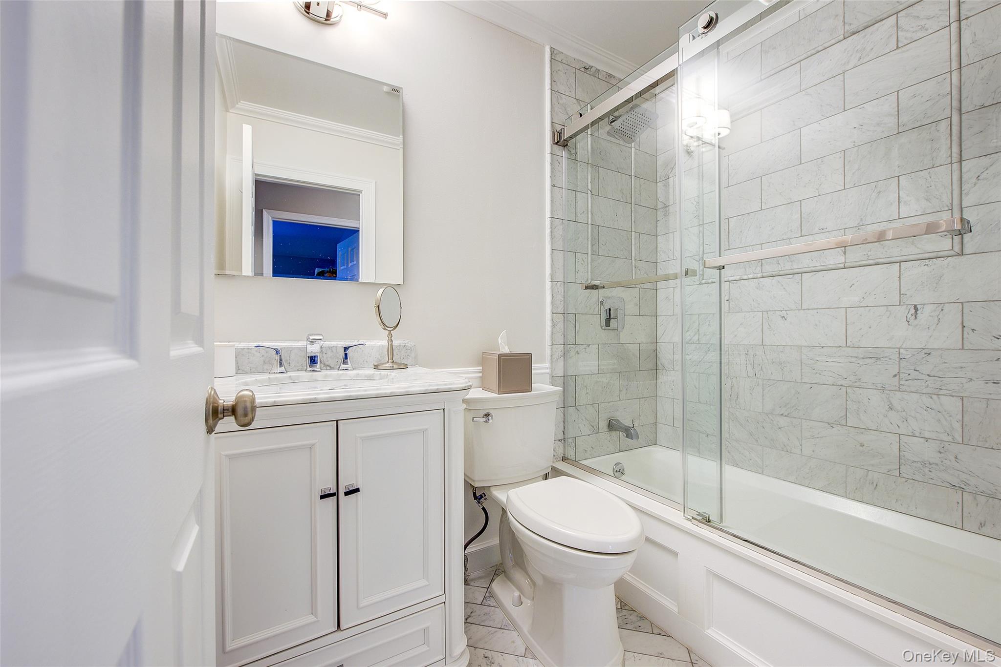 161 Beach 128th Street, Unit 1B Queens, NY 11694 - Photo 34 of 36 a bathroom with a sink toilet and shower