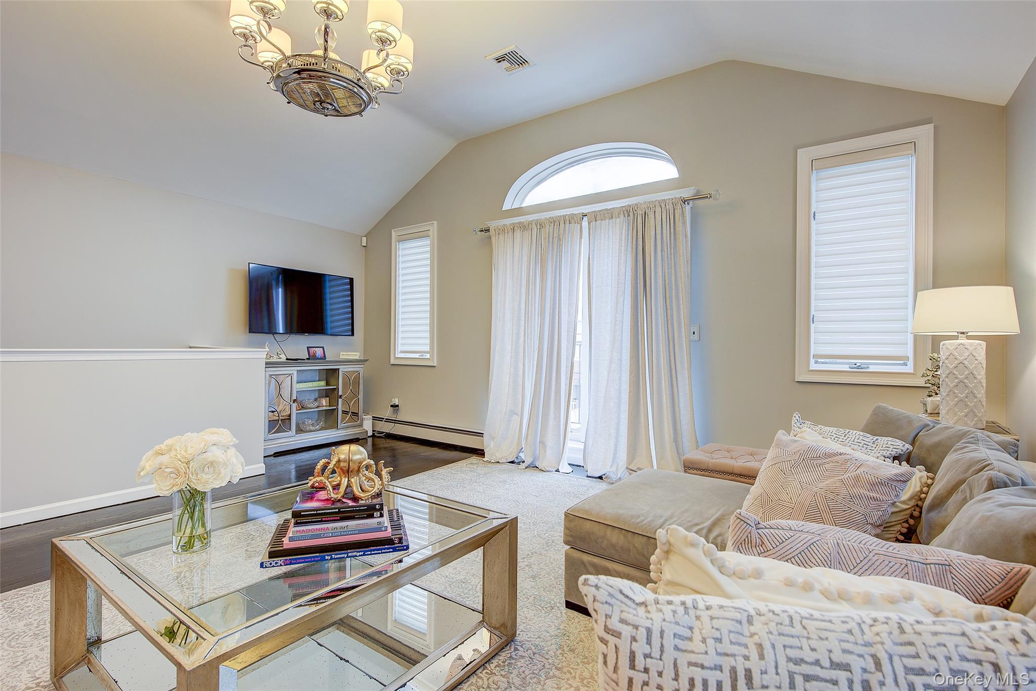 161 Beach 128th Street, Unit 1B Queens, NY 11694 - Photo 5 of 36 a living room with furniture