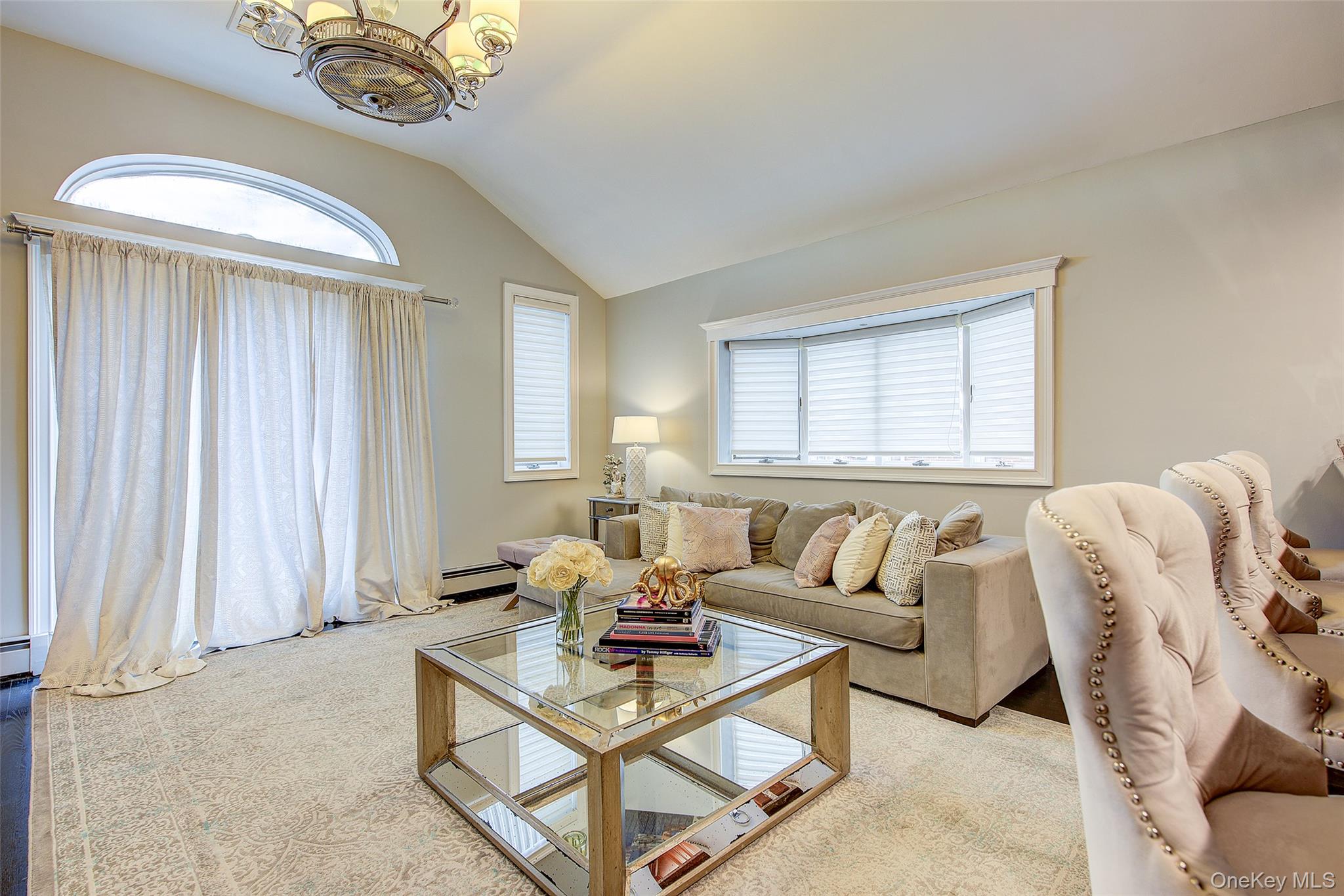 161 Beach 128th Street, Unit 1B Queens, NY 11694 - Photo 6 of 36 a living room with furniture and a large window