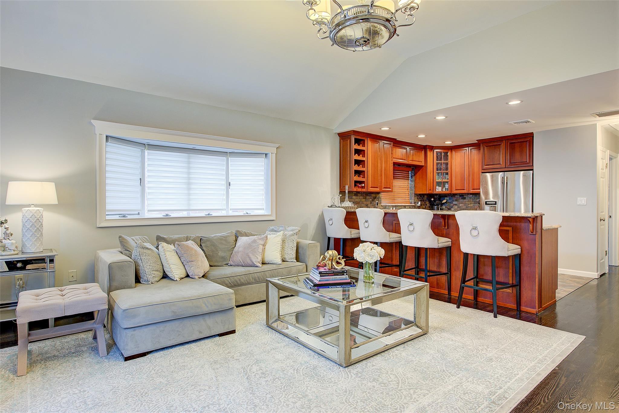 161 Beach 128th Street, Unit 1B Queens, NY 11694 - Photo 10 of 36 a living room with furniture and a large window