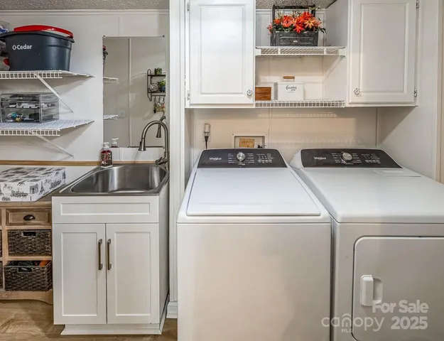a kitchen with a cabinets and a stove top oven