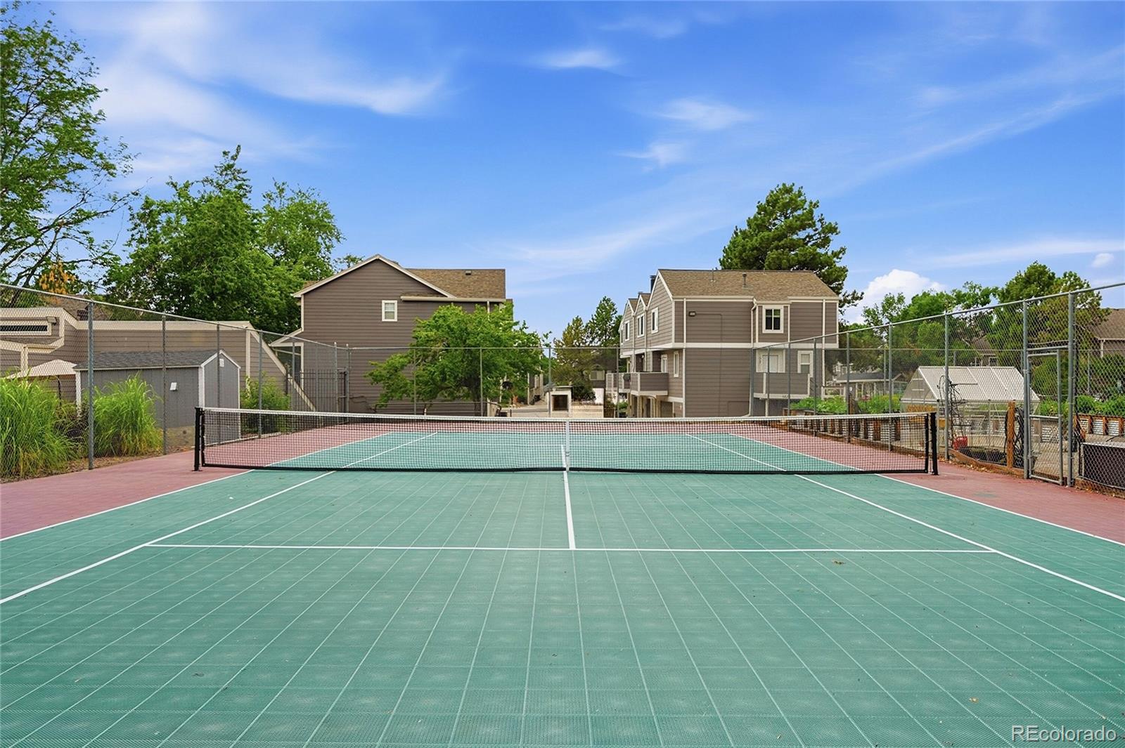 6855 West 84th Way, Unit 32 Arvada, CO 80003 - Photo 27 of 37 a view of a tennis court