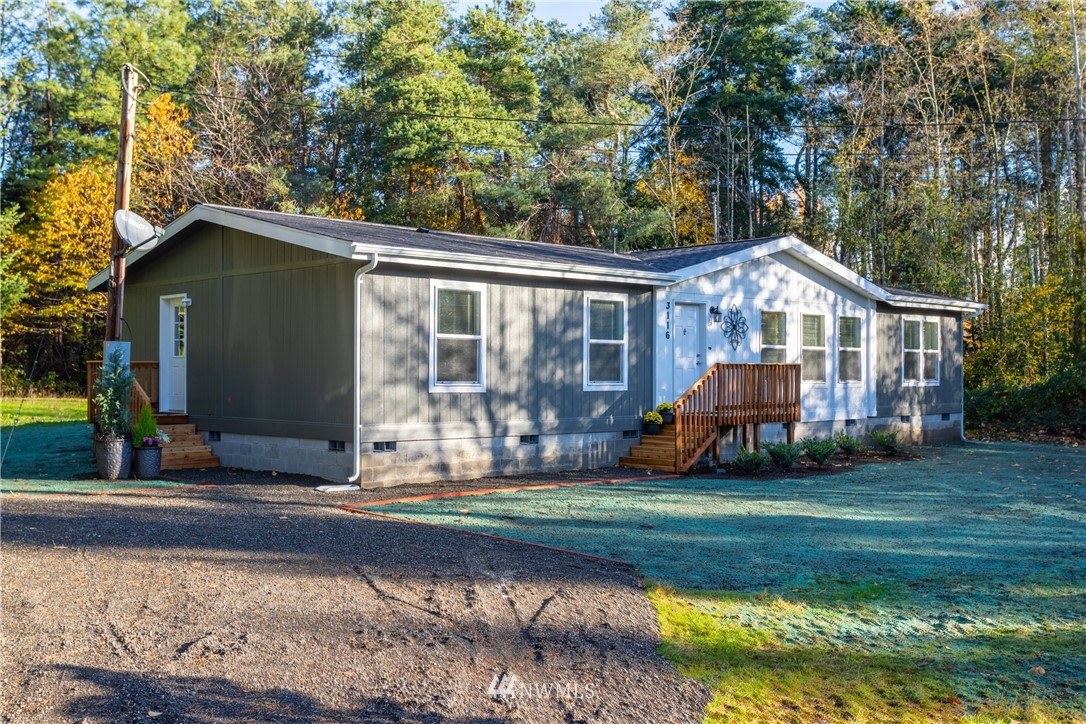 3116 Creasey Road Custer, WA 98240 - Photo 2 of 28 a front view of a house with garden