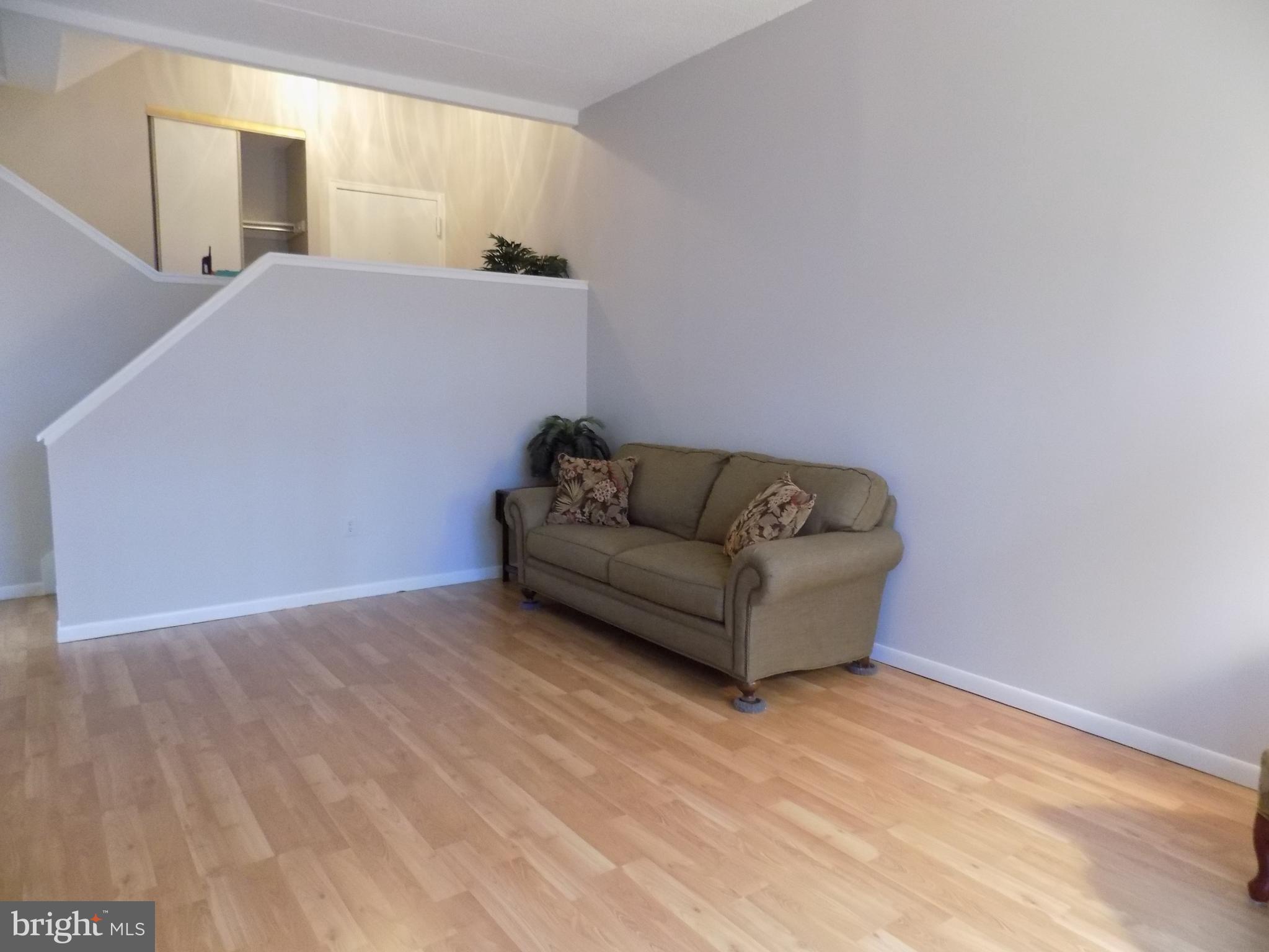 11564 Rolling Green Court, Unit 101 Reston, VA 20191 - Photo 7 of 71 Family room with soaring 2 story ceilings